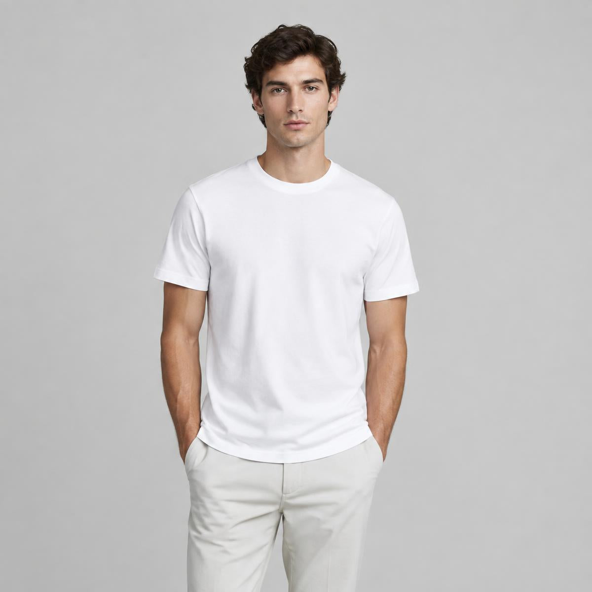 Model wearing the WHITEPLAIN white T-shirt